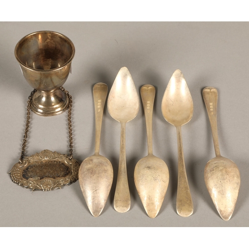 164 - A silver Birmingham bottle label, a silver egg cup and a set of five old english patterned grapefrui... 