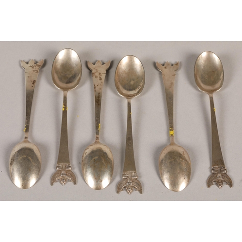 169 - Set of Siam white metal teaspoons with winged terminals. Stamped sterling 68 grams