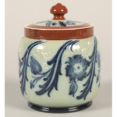 174 - McIntyre Tobacco jar and cover, brown bands with blue stylised flower decoration, brown factory stam... 