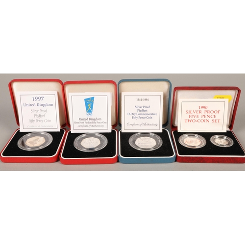 178 - Four Royal Mint cased coins to include 1990 silver proof 5pence two coin set, 1997 silver proof pied... 