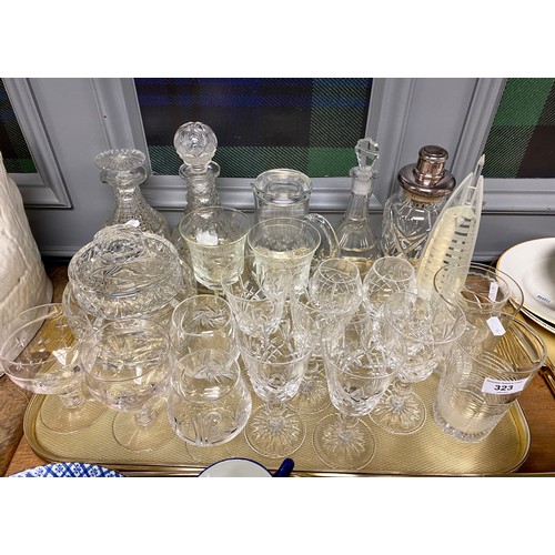 323 - Assorted crystal glasses, cocktail shaker, crystal decanters, etc