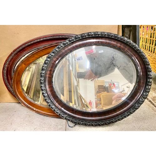 476 - Three oval mirrors in hardwood frames