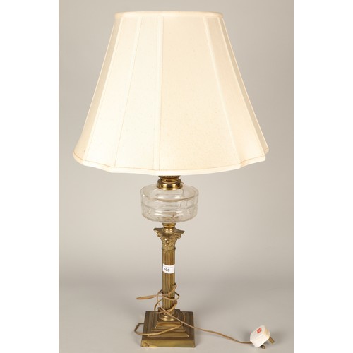 506 - Lamp with brass base and glass neck