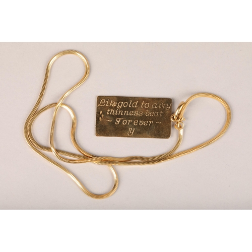 114 - 18ct gold Egyptian pendent with a 18ct gold chain, stamped 750, 33 grams