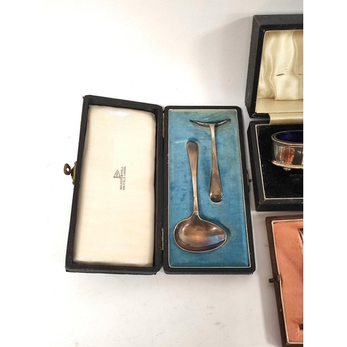 13 - Silver three piece condiment set, plain oval, Birmingham 1935 and a spoon and pusher, both cased.