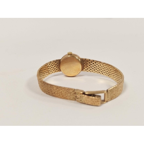 37 - Lady's Omega 9ct gold watch on integral textured bracelet, 1960's. 23.4g gross. Original case.