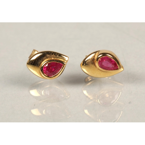 103 - Pair of gold and red stone earrings