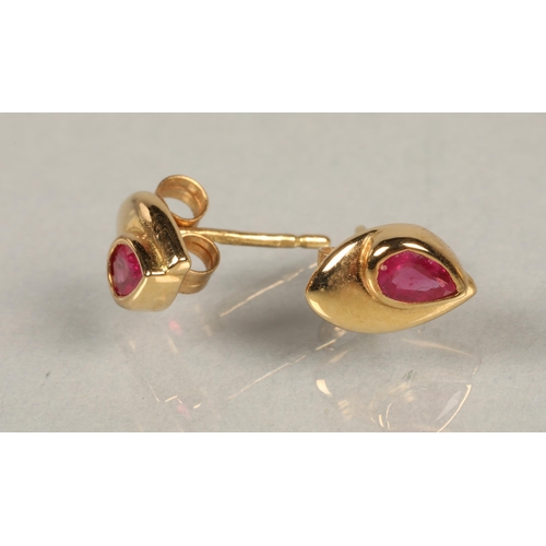 103 - Pair of gold and red stone earrings