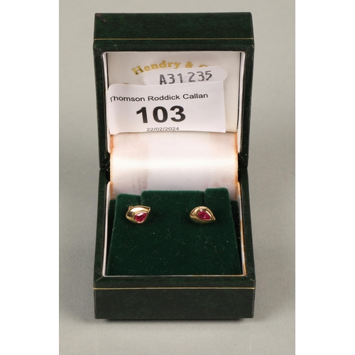 103 - Pair of gold and red stone earrings