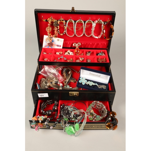 121 - Quantity of costume jewellery in tiered box