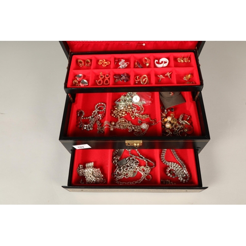 122 - Quantity of costume jewellery in tiered box