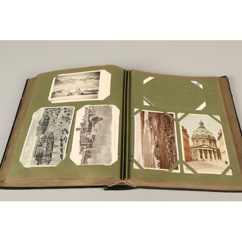 212 - A postcard album containing war related cards, topographical etc