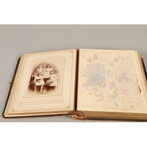 221 - Edwardian photo album containing family portraits