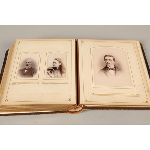 221 - Edwardian photo album containing family portraits