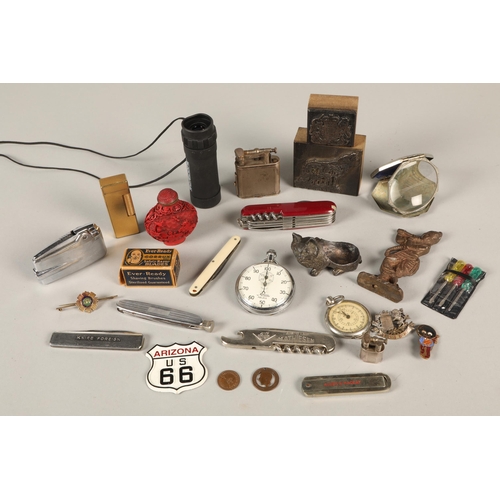 222 - Box containing various curios, to include hinged magnifying glass, stop watches, lighters etc