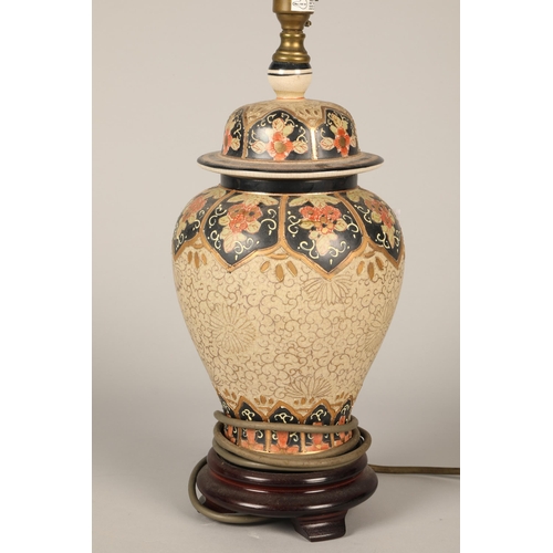 521 - Oriental-style lamp with foliage design, approx. 37cm height