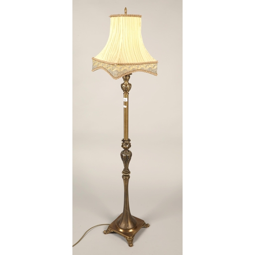 539 - Large brass lamp with ornate decoration, approx. 120cm height