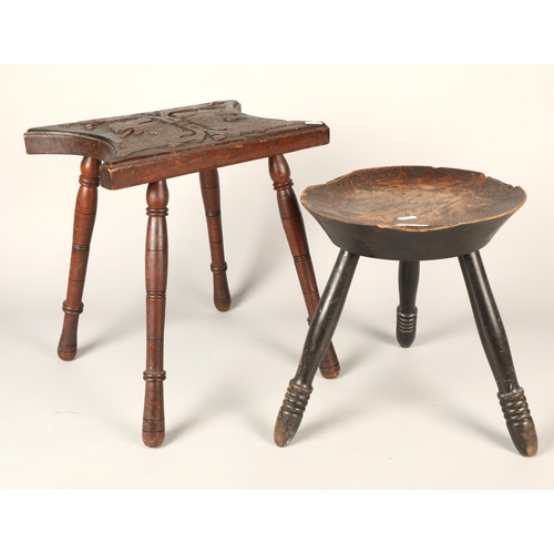 546 - Two carved stools with designs in relief