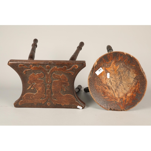 546 - Two carved stools with designs in relief