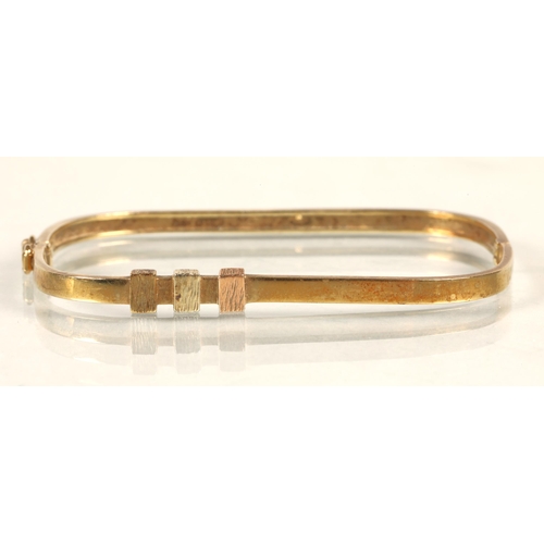 82 - 9 ct gold rectangular bracelet, with three coloured gold square detail, 8 grams