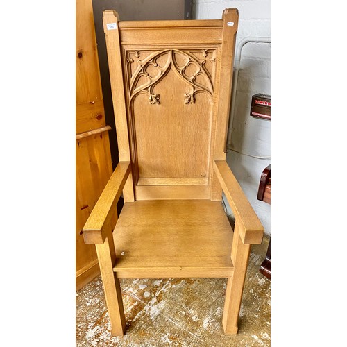 553 - Oak church chair with decoration in relief (Church of Scotland provenance), H 135cm, W 54cm, D 62cm