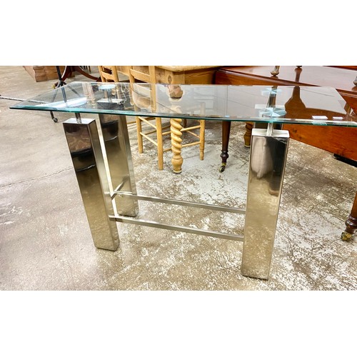 581 - Contemporary glass table with stainless steel legs, H 75cm, W 122cm, D 43cm