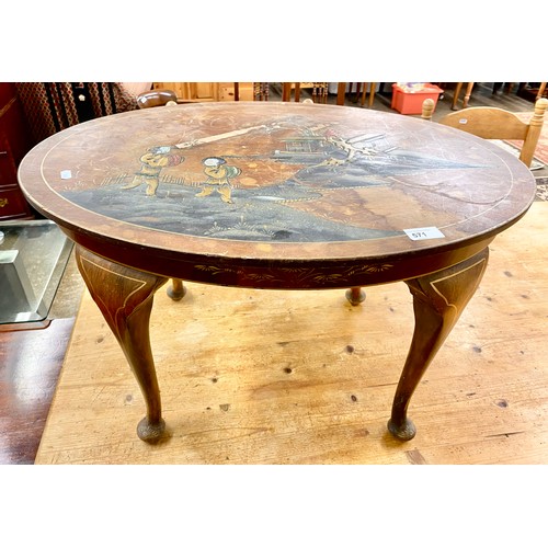 571 - Oval inlaid coffee table with Oriental scene decoration