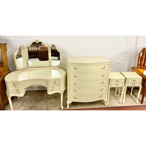 564 - Contemporary ornate bedroom suite to include dressing table with mirror, serpentine five-drawer ches... 