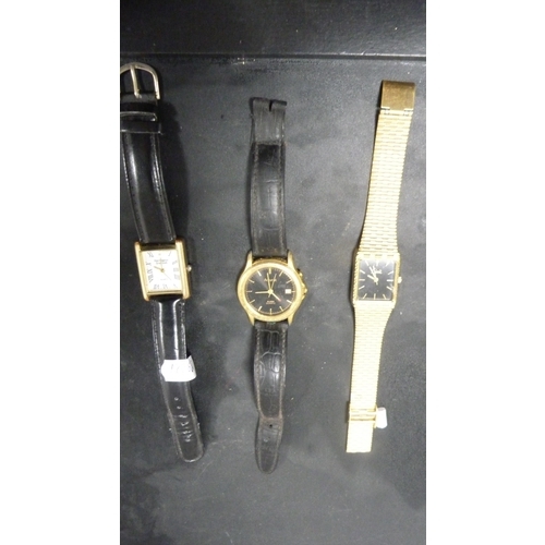 245 - Three quartz fashion watches.