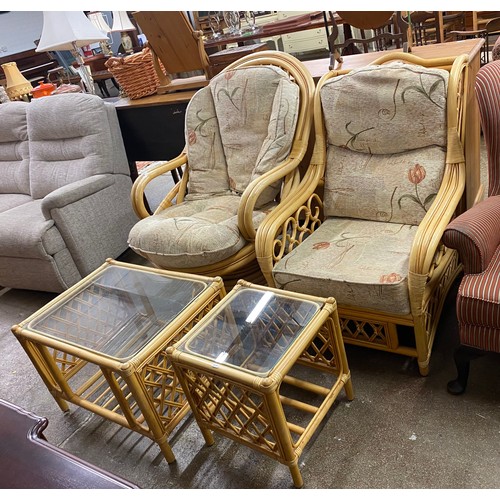 633 - Conservatory bamboo suite, comprising two armchairs, two glass topped coffee tables (4)