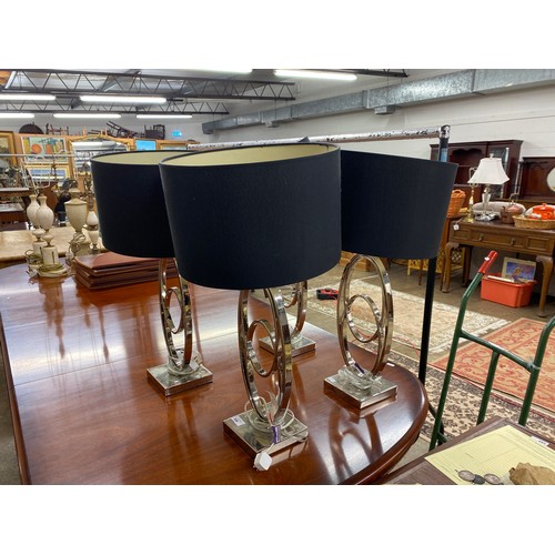 566 - Four contemporary lamps