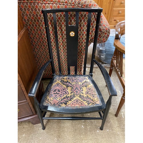 583 - Small armchair with floral upholstery