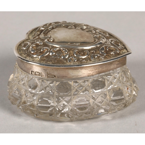 163 - A pair of silver topped heart shaped trinket boxes and also another silver topped pin box.