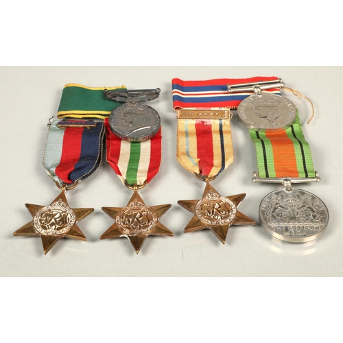 93 - Collection of WWII medals to include The Defence Medal,  Territorial, Africa star, Italy star.