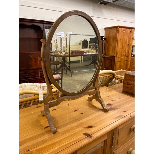 606 - Oval mahogany shaving mirror