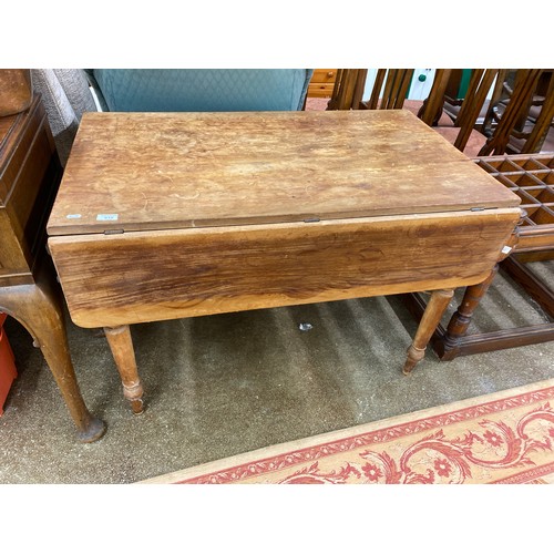 615 - Drop leaf two drawer pine kitchen table