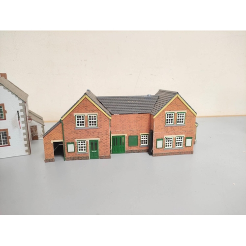 200 - Three boxes of model railway buildings to include Hornby Coach Siding Platform R417, platforms, stat... 