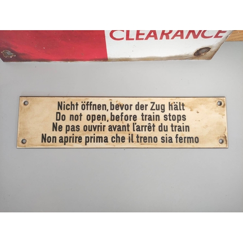 437 - An enamel red and white checkered warning limited clearance sign 30.5 x 30.5cm, and a European train... 