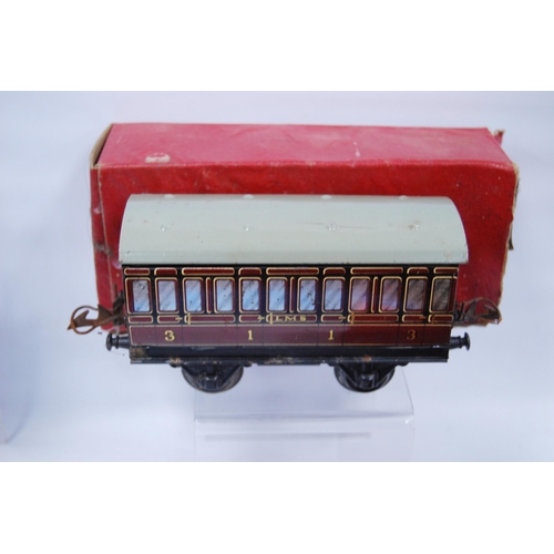 277 - Five Hornby by Meccano O gauge coaches and wagons comprising two French Voiture no. 1 coaches, 3113,... 