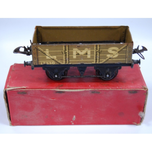 277 - Five Hornby by Meccano O gauge coaches and wagons comprising two French Voiture no. 1 coaches, 3113,... 