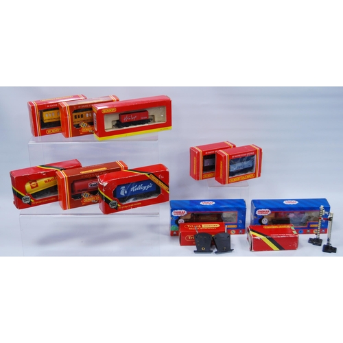 280 - Group of Hornby OO gauge wagons, van and tender to include R.222 Kelloggs closed van, R.227 Shell ta... 