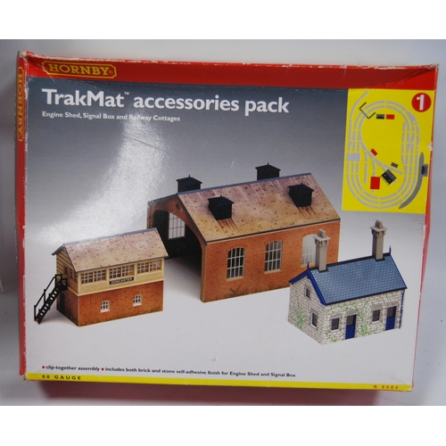 281 - Group of Hornby OO gauge railway accessories and track to include R8084 Trakmat accessories pack, R.... 