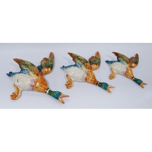 223 - Set of three Beswick graduated flying ducks, no. 5961, 5962 and 5963, drilled holes to the reverse f... 