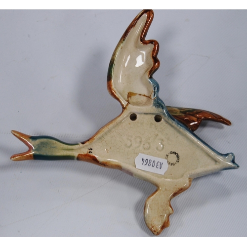 223 - Set of three Beswick graduated flying ducks, no. 5961, 5962 and 5963, drilled holes to the reverse f... 