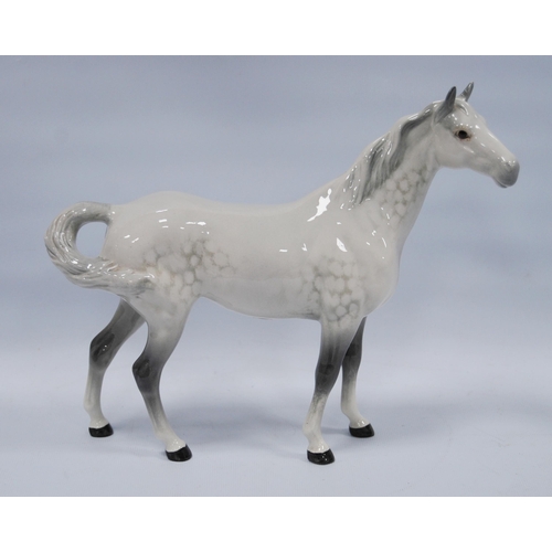 225 - Beswick model of a dapple grey horse, 21.5cm high.