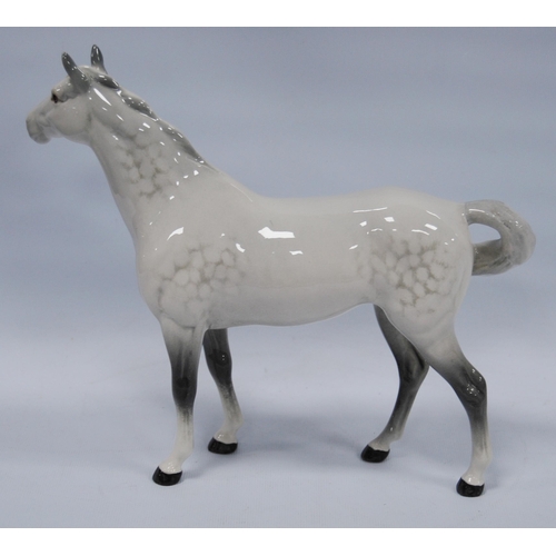 225 - Beswick model of a dapple grey horse, 21.5cm high.