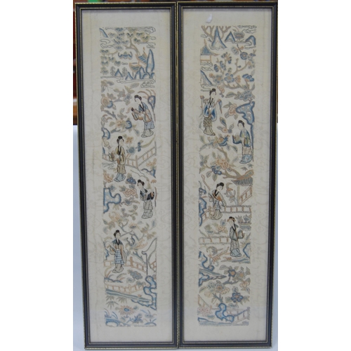 201 - Two framed Oriental sleeve panels, each 50cm x 9cm.  (2)