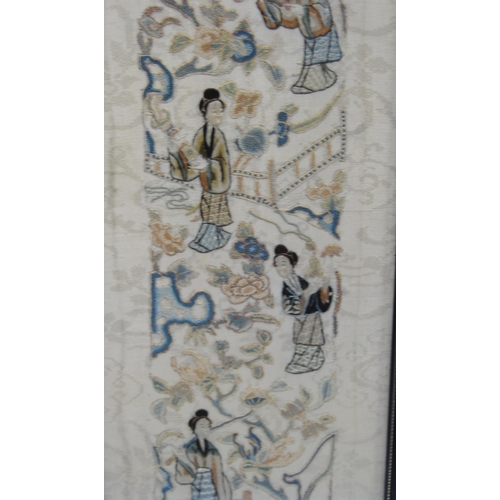 201 - Two framed Oriental sleeve panels, each 50cm x 9cm.  (2)