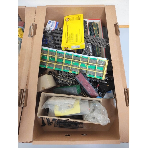 211 - Two boxes of model railway components, track and model buildings. (2)