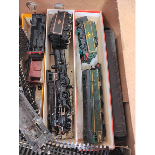 211 - Two boxes of model railway components, track and model buildings. (2)